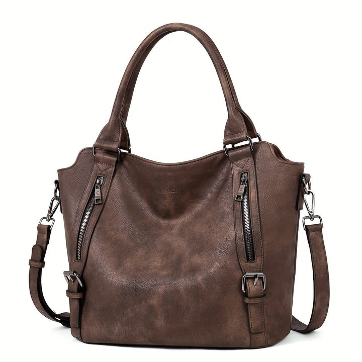 A woman wearing a roomy shoulder bag across her body while out running errands.
