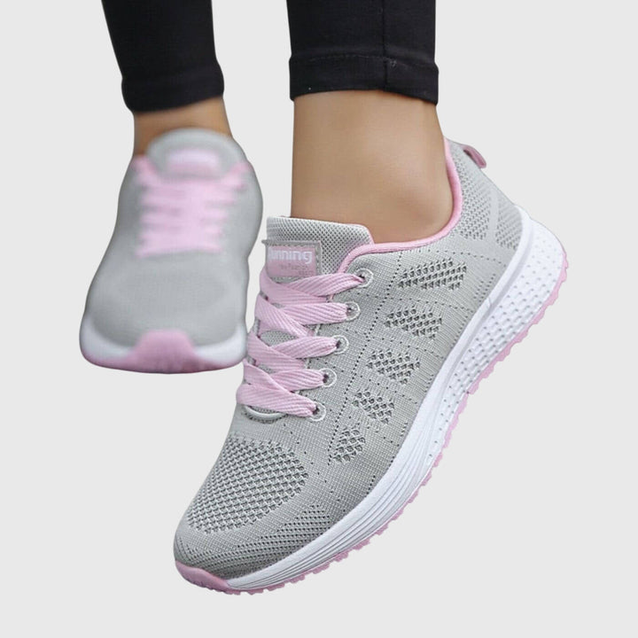 A woman enjoying a gentle stroll in cushioned orthopaedic comfort shoes.