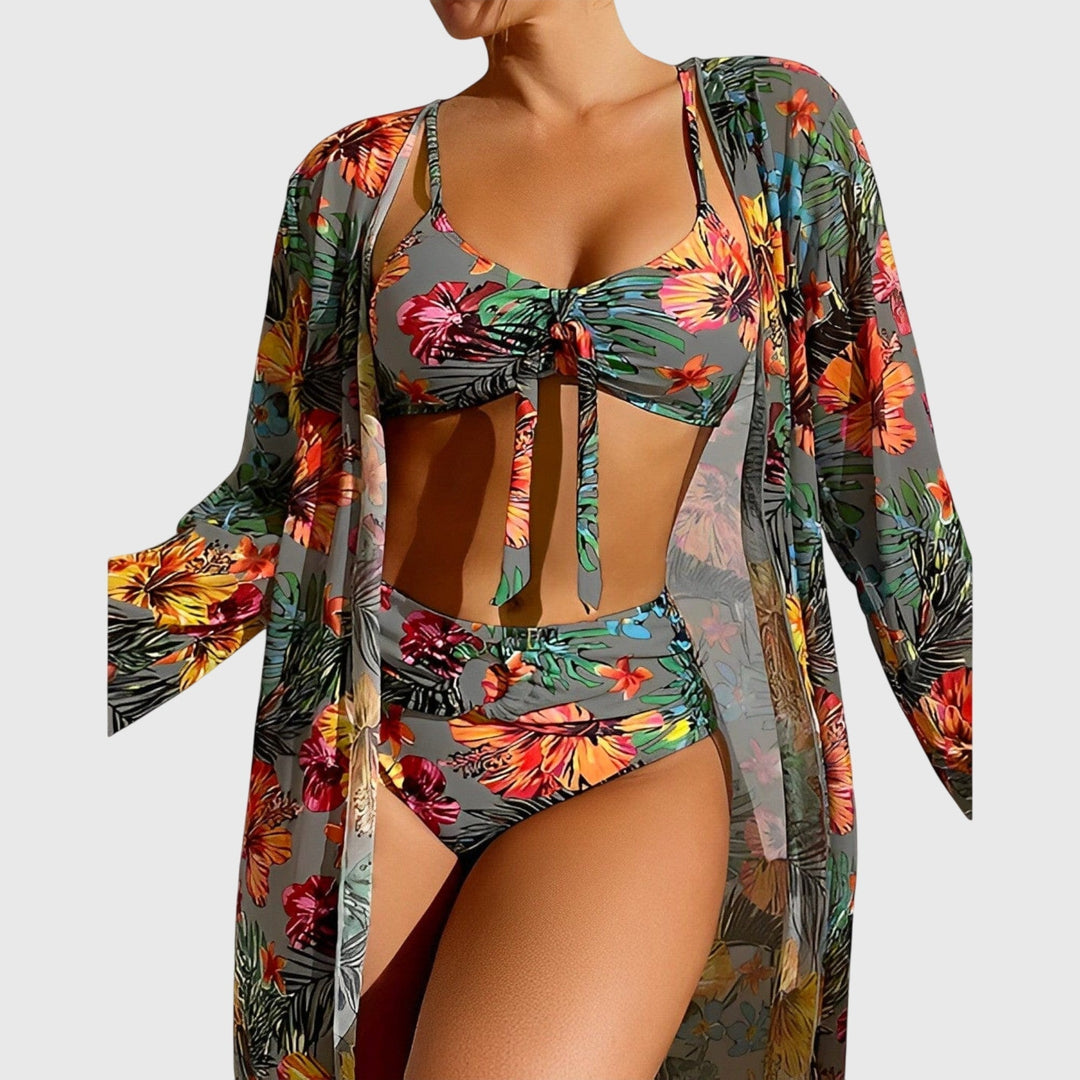 A woman by the pool in a matched printed bikini set, relaxed and confident in the summer sun.