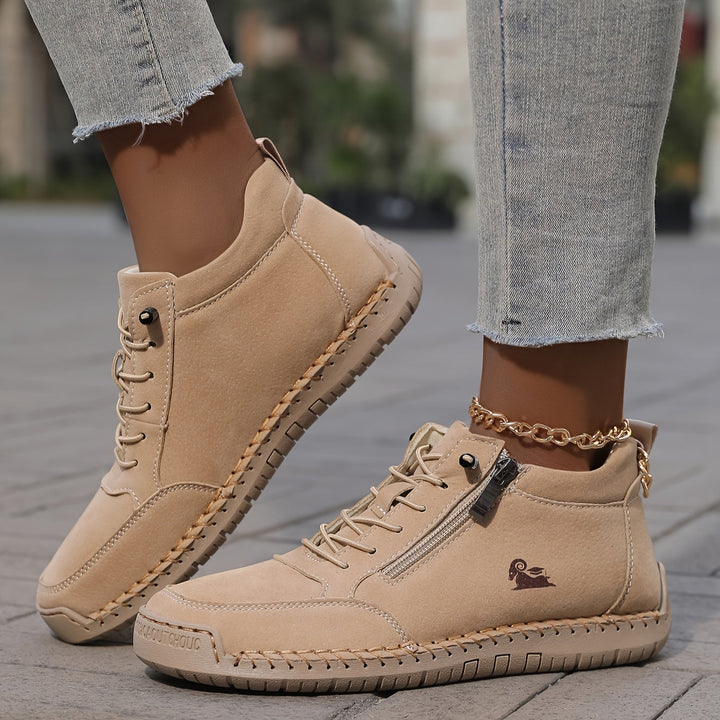 A woman standing comfortably in wide-fit therapeutic comfort shoes