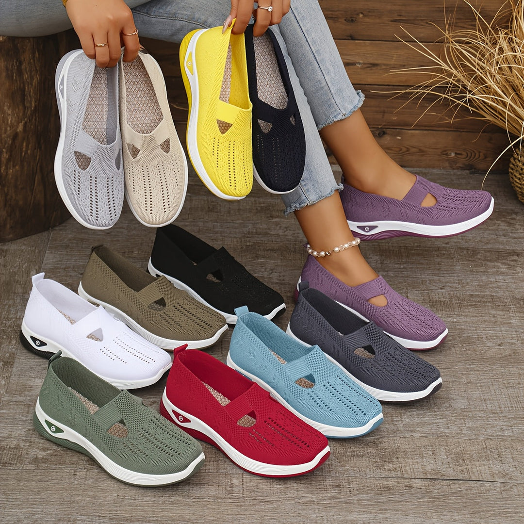 A woman stepping into easy slip-on comfort sneakers with no laces.