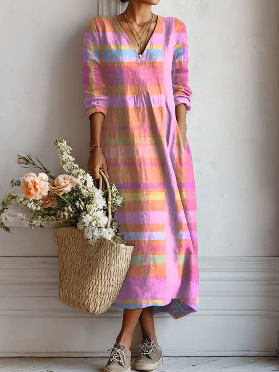 A woman wearing a soft, flattering day dress, relaxed and elegant as she heads out.