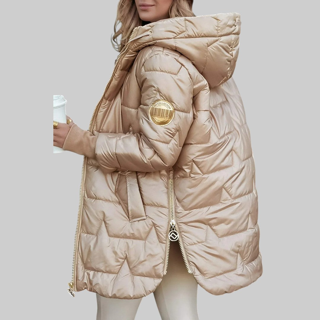 A woman wearing a hooded fall coat in a timeless tone, sheltered from the wind.