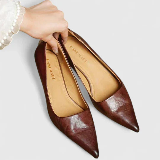 A woman in supportive everyday heels moving from the office to an evening event.