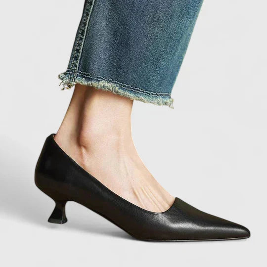 A woman in supportive everyday heels moving from the office to an evening event.