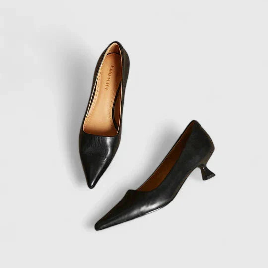 A woman in supportive everyday heels moving from the office to an evening event.