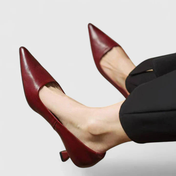 A woman in balanced comfort heels moving from the office to an evening reception.