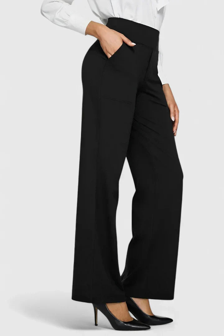 A woman in elegant straight-leg pants with pockets, styled for a polished everyday look.