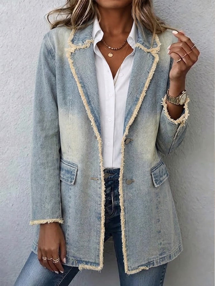 Women's oversized blazer in a pale washed look with frayed edges