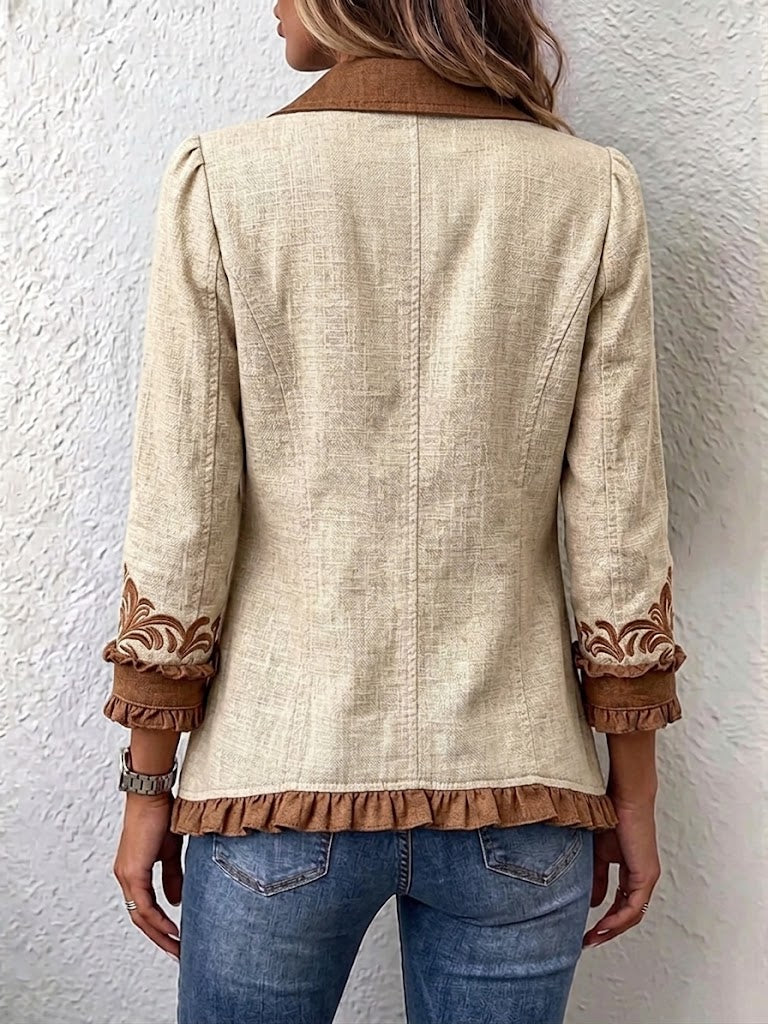 Women's cream blazer with brown ornament border