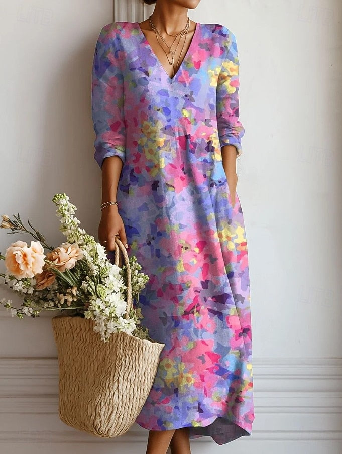 A woman wearing a soft, flattering day dress that moves naturally as she walks.